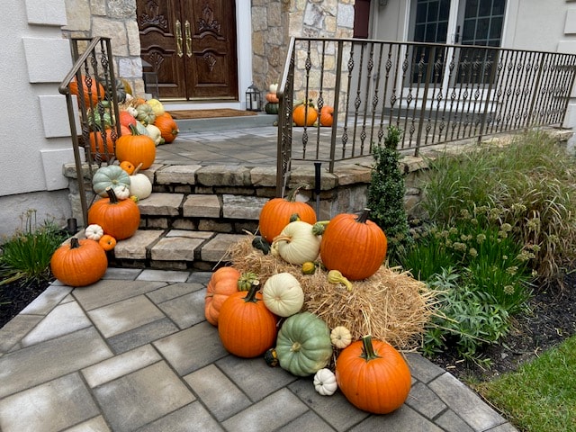 Autumn porch with lanterns and harvest décor